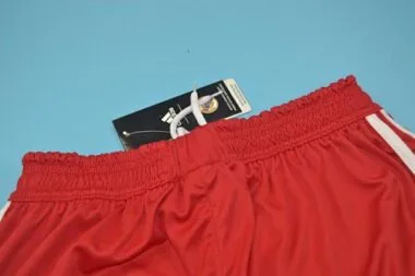 11-12 Pantalones cortos rojos del Real Madrid