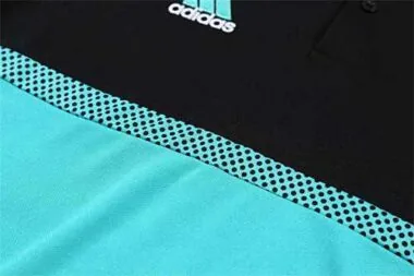Polo del Real Madrid en verde fluorescente