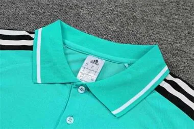 Polo del Real Madrid en color verde claro