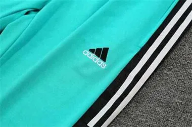 Polo del Real Madrid en color verde claro