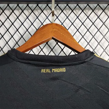 11-12 Real Madrid, maglia da trasferta nera a maniche lunghe