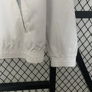 2023/24 PSG reversible windbreaker white