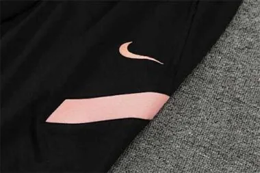 PSG-poloshirt met zwarte en roze mouwen