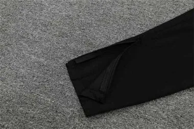 PSG-poloshirt met zwarte en roze mouwen