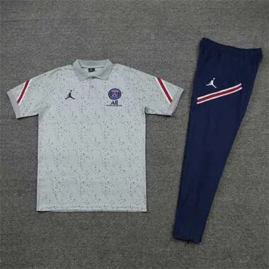Polo Jordan PSG cinzento com padrão de flores